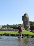 SX07970 Kristina crossing stepping stones at Ogmore Castle.jpg